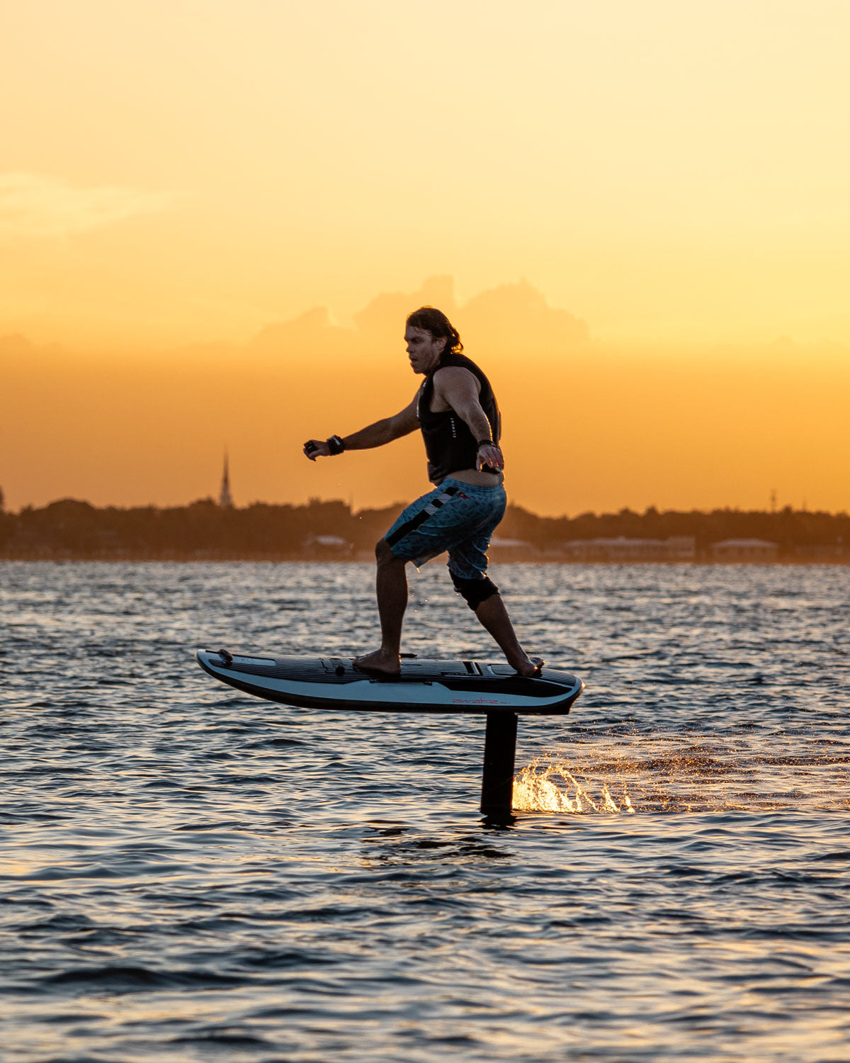 Awake VINGA 3 electric eFoil being ridden during sunset